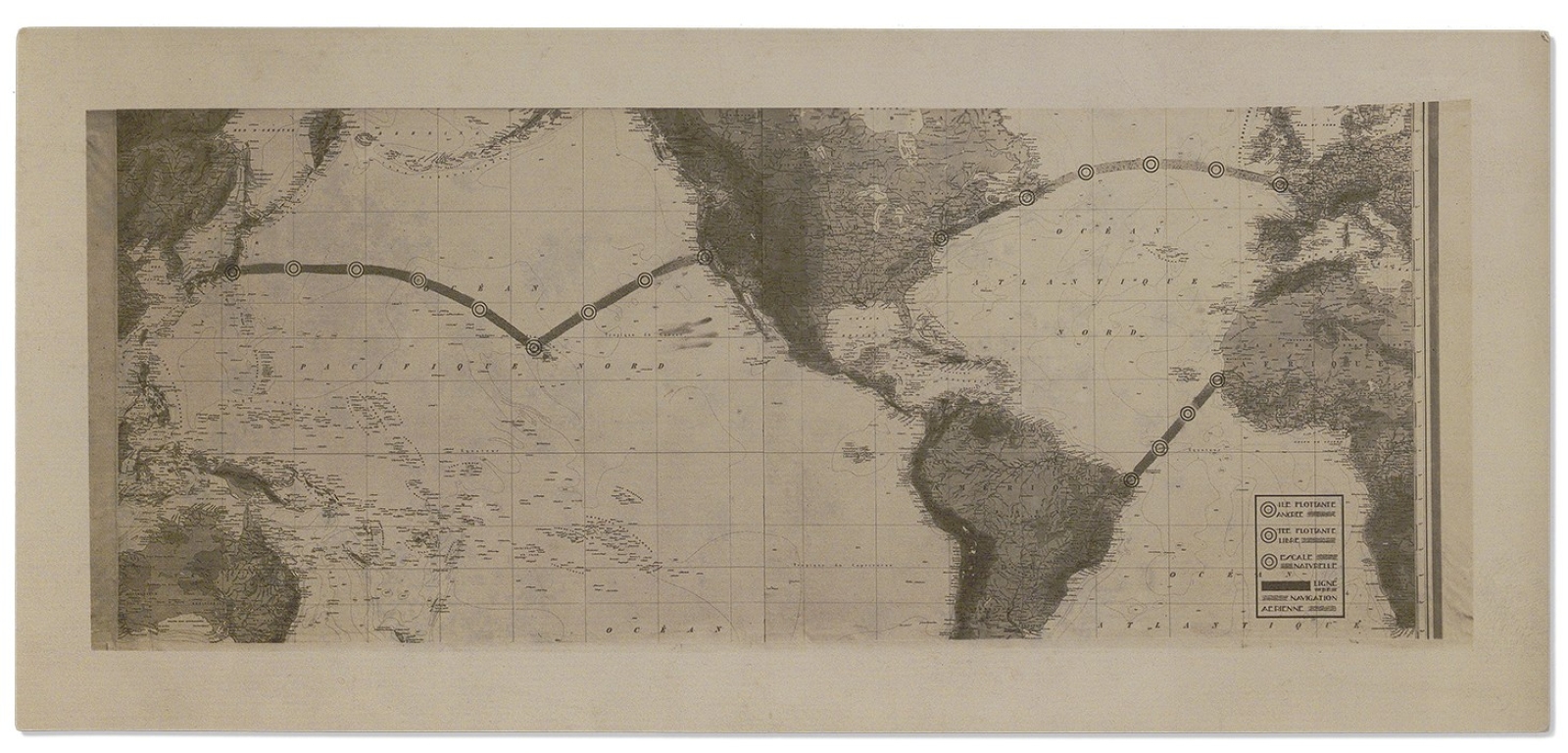 Black-and-white map showing the Atlantic and Pacific Oceans with parts of North and South America, Europe, and Africa. Marked routes cross the oceans with labeled points along the path.