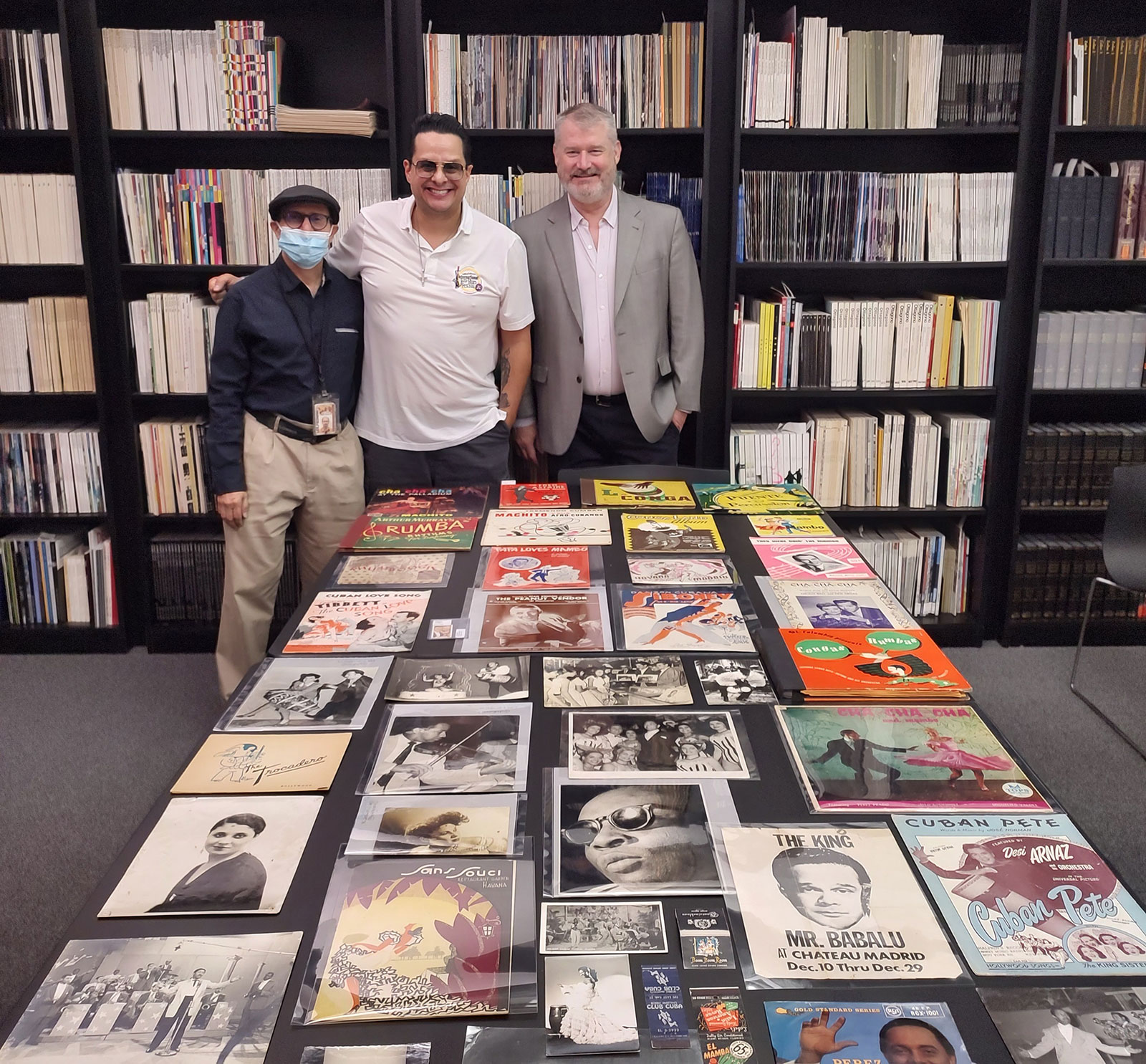 Photograph of Tito Puente, Jr., and library staff