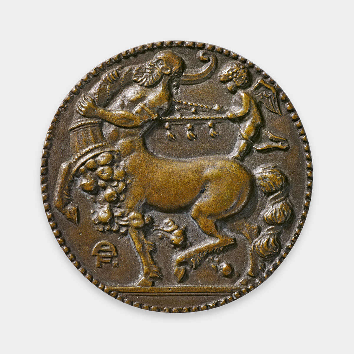 This bronze medal features a centaur—a mythical creature with a human upper body and a horse-like lower body—walking while holding a cornucopia. The centaur is shown in profile from the left side and spans the full height of the medal. He has a long beard and is depicted mid-stride, with his left hind leg slightly bent. The human torso is muscular and well-defined, standing out against the darker tones of the horse body. The centaur’s horse half is detailed with a smooth coat, and his long, flowing tail has textured details. A variety of fruits and leaves spill from the downward-tilted cornucopia, falling beneath the centaur's hooves into the foreground. To the right of the centaur, a small winged child, with short curly hair and dressed in a thin gown, stands on the centaur's back. The child pulls the centaur back using a rope adorned with five small tassels.